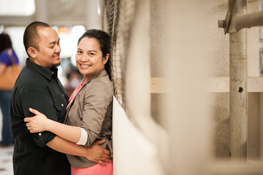 Bing and Roy share a moment inside Union Station during their engagement session with Washington DC Wedding Photographer Ben Lau.