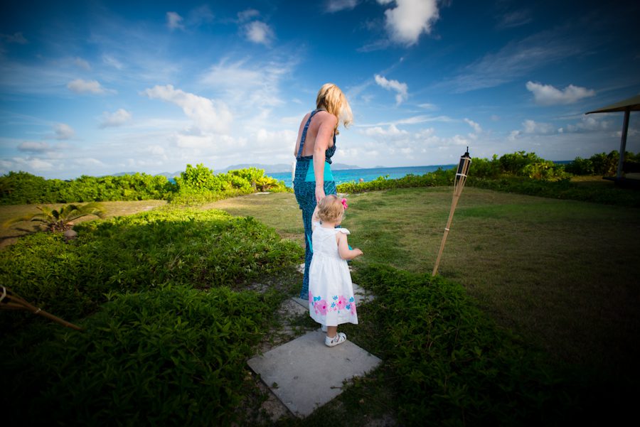 Lauren and Sophie make an entrance towards the beach at the CuisinArt Resort & Spa in Anguilla BWI. Captured by Caribbean Destination Wedding Photographer Ben Lau.