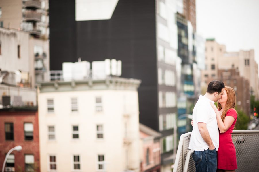 Lauren and Tony share a kiss on top of High Line Park during their engagement session with awesome New York City wedding photographer Ben Lau.