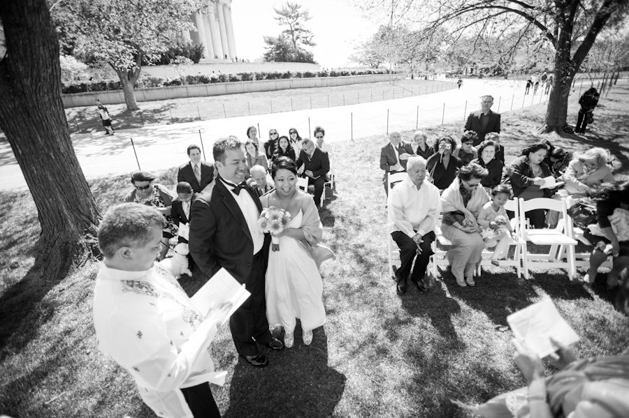 Washington DC Wedding Ceremony in front of the Jefferson Memorial. Captured by Ben Lau Photography.