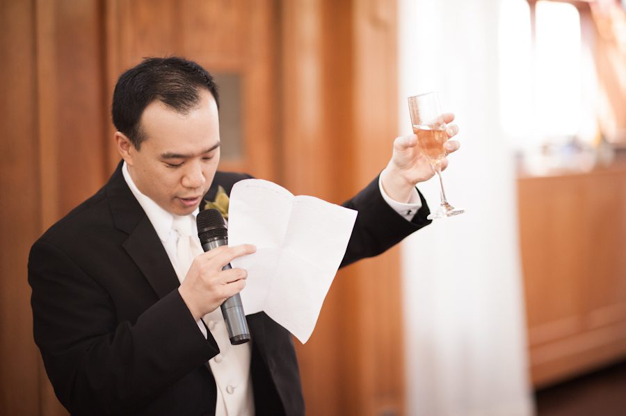 Best man makes a toast at Hae Yoon and Bernard's wedding in Snug Harbor, Staten Island. Captured by awesome wedding photographer Ben Lau.