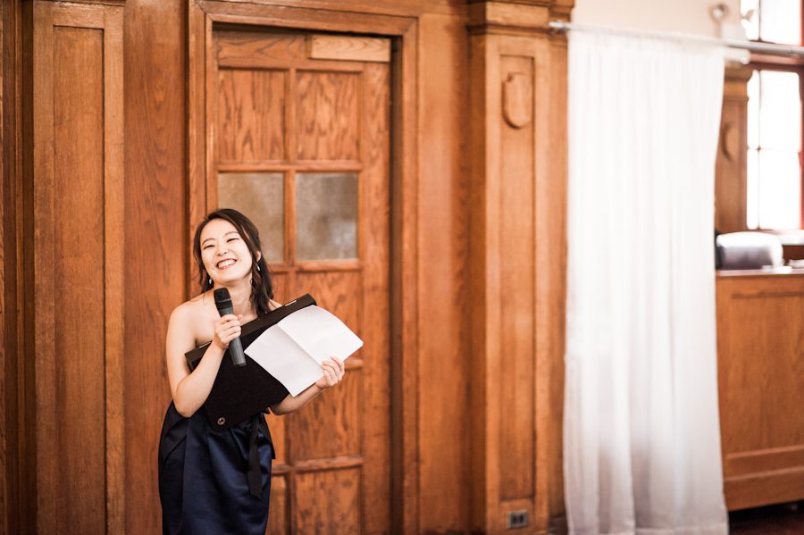 Maid of Honor makes a toast to Hae Yoon and Bernard at their reception in Snug Harbor, Staten Island. Captured by awesome New York City wedding photographer Ben Lau.