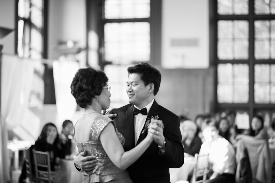 Groom dances with his mother during the mother-son dance at Snug Harbor, Staten Island. Captured by New York City wedding photographer Ben Lau.