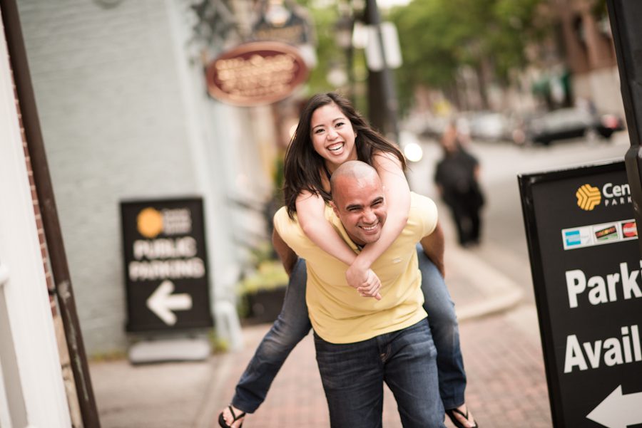 Maricar rides on Izaak's back during their engagement session with Northern Virginia wedding photographer Ben Lau.