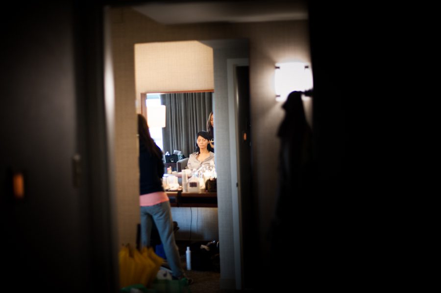 Yulan gets ready at the Westin Hotel in Princeton, NJ. Captured by awesome NJ wedding photographer Ben Lau.