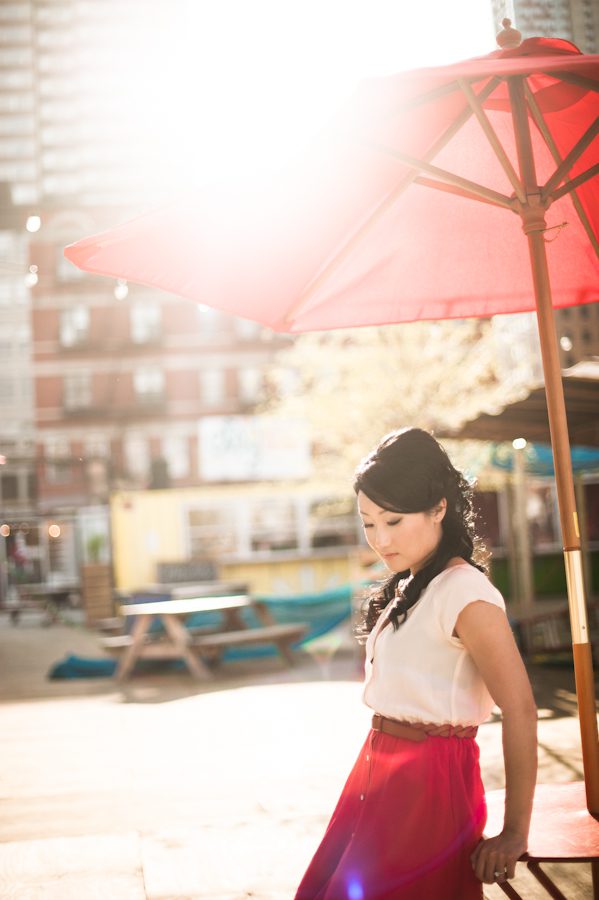 Yumi's solo portrait in Dekalb Market during their engagement session with awesome NYC wedding photographer Ben Lau.
