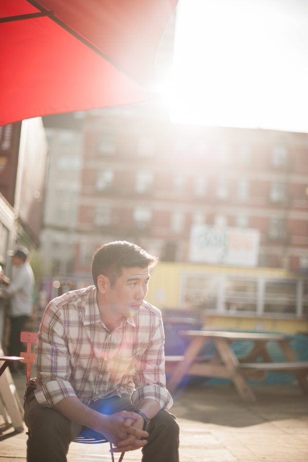Alan's solo portrait in Dekalb Market during their engagement session with awesome NYC wedding photographer Ben Lau.