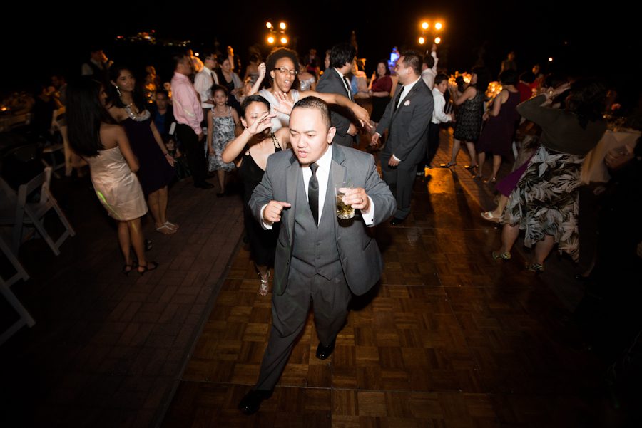 Groom dances at his wedding at the Oxon Hill Manor in Oxon HIll, MD. Captured by awesome NJ wedding photographer Ben Lau.