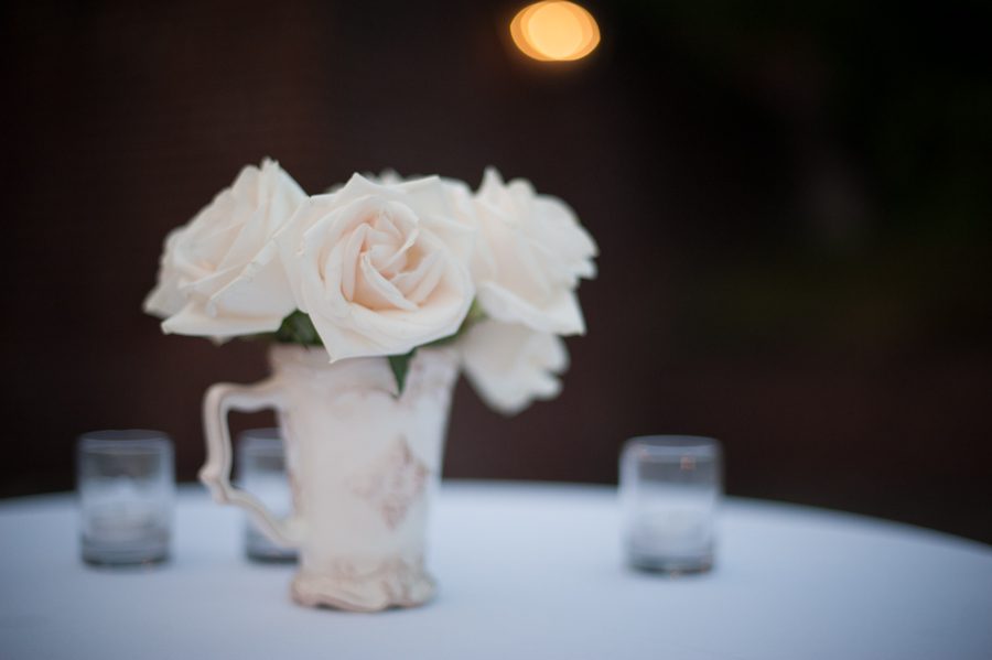 Floral centerpeices at Bing and Roy's wedding at the Oxon Hill Manor in Oxon Hill, Maryland. Captured be awesome NJ wedding photographer Ben Lau.