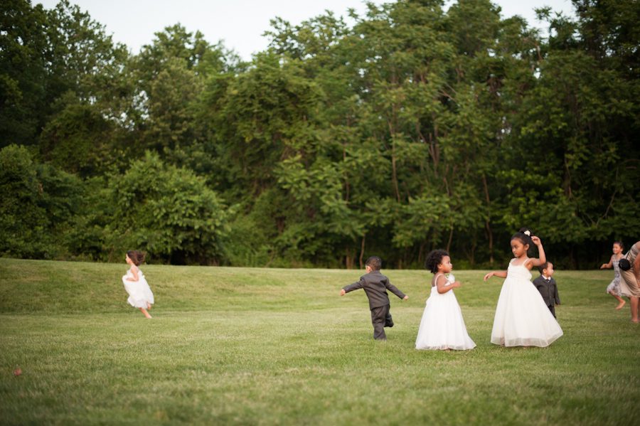Children play at Bing and Roy's wedding at the Oxon Hill Manor in Oxon Hill, Maryland. Captured be awesome NJ wedding photographer Ben Lau.