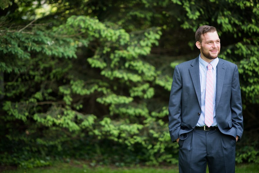 Eric poses for a photo on his wedding day at the Bayard Cutting Arboretum on Long Island, NY. Captured by awesome NJ wedding photographer Ben Lau.