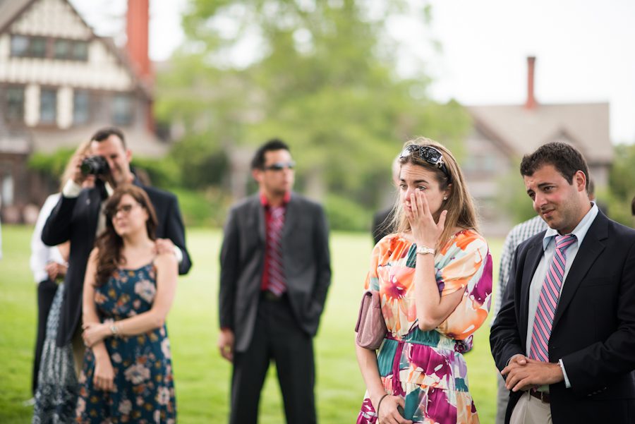 Guests cry during wedding ceremony at the Bayard Cutting Arboretum in Long Island, NY. Captured by awesome NJ wedding photographer Ben Lau.