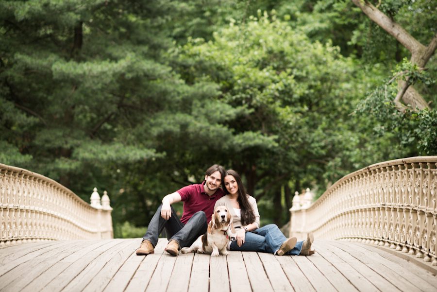 Margot and Alex pose with their dog Baby Girl during their engagement session in Central Park with awesome NY wedding photographer Ben Lau.