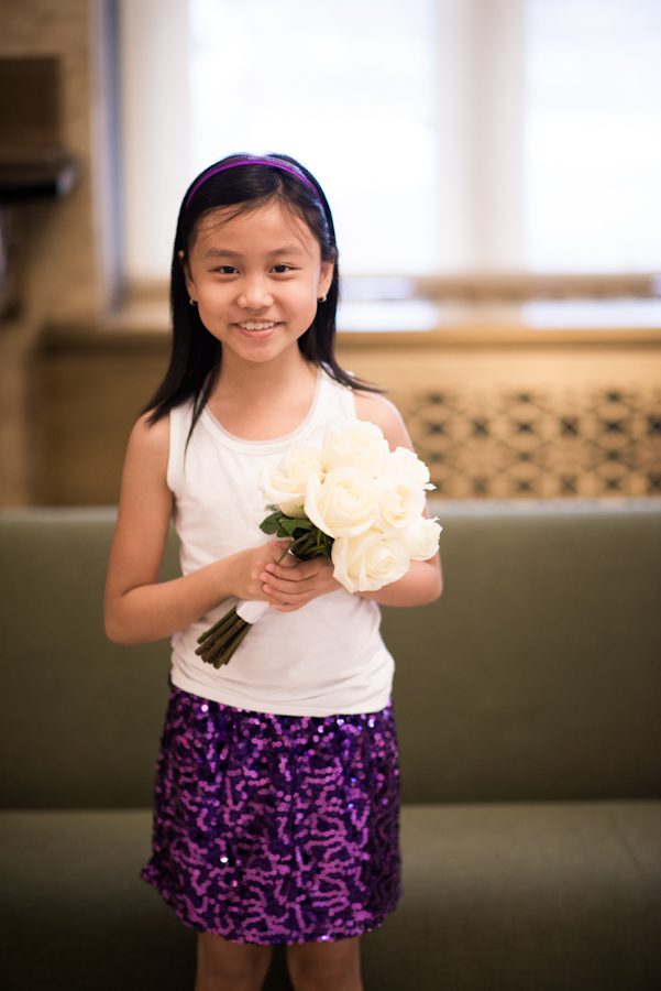 Haley poses with bouquets during May and Lee's New York City Hall wedding ceremony. Captured by awesome NJ wedding photographer Ben Lau.