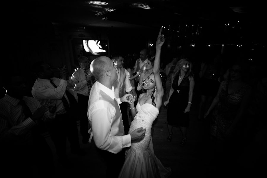 Bride and groom dance the night away on their wedding day at The Manor in West Orange. Captured by best NJ wedding photographer Ben Lau.