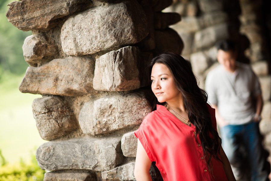 Sally and Terence pose along some columns in Bear Mountain, NY. Captured by awesome NJ wedding photographer Ben Lau.