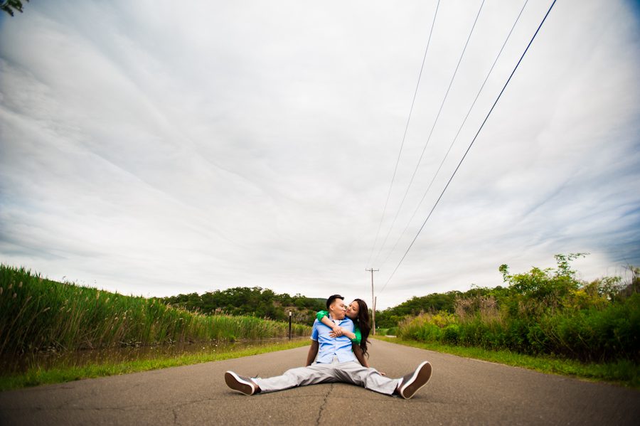 Sally and Terence pose by a roadside during their engagement session with awesome NJ wedding photographer Ben Lau.