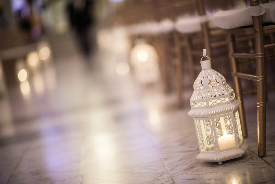 Lanterns along the aisle on Sandra and Paul's wedding day in Montreal, QC. Captured by destination wedding photographer Ben Lau.