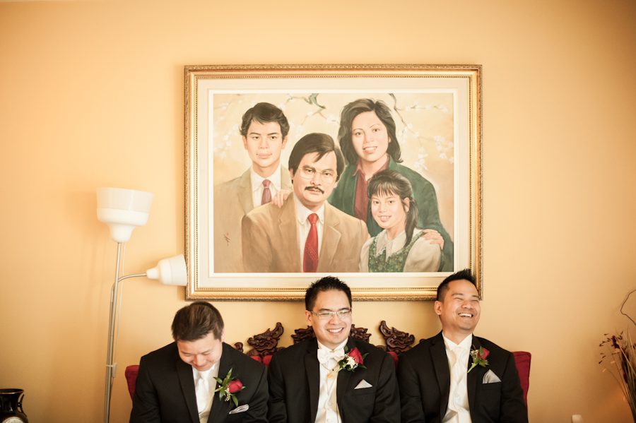 Groomsmen share a moment in Montreal, QC. Captured by destination wedding photographer Ben Lau.