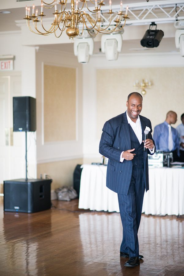 Speeches during Sandra and Jamal's wedding at the Coral House in Baldwin, NY. Captured by awesome NJ wedding photographer Ben Lau.