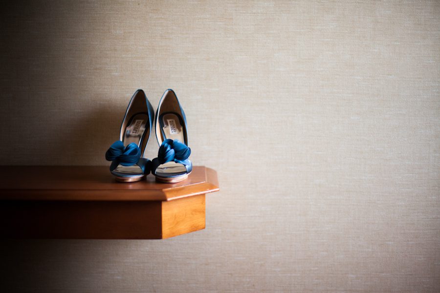 Bride's shoes before her wedding ceremony at the Coral House in Baldwin, NY. Captured by awesome NJ wedding photographer Ben Lau.