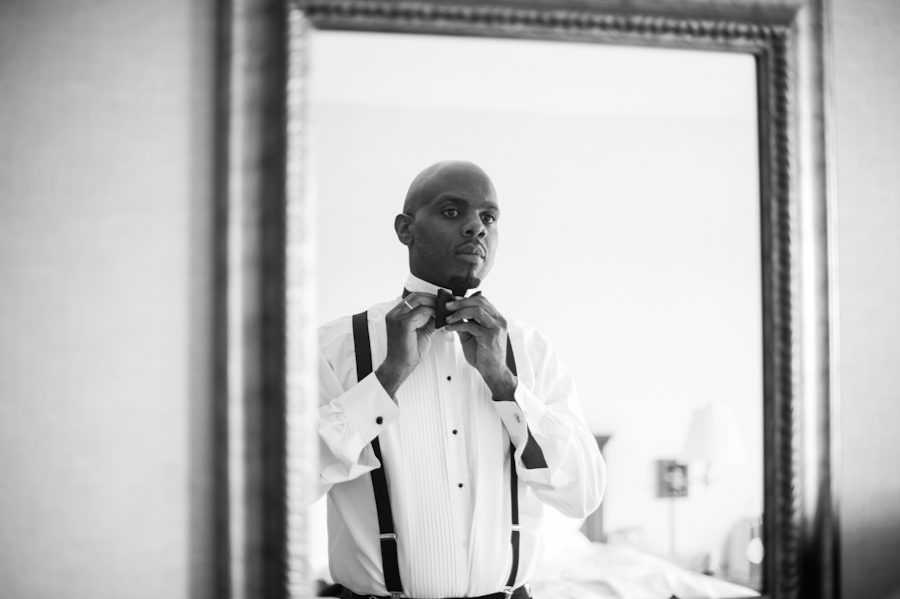 Groom preps for his wedding at the Coral House in Baldwin, NY. Captured by awesome NJ wedding photographer Ben Lau.