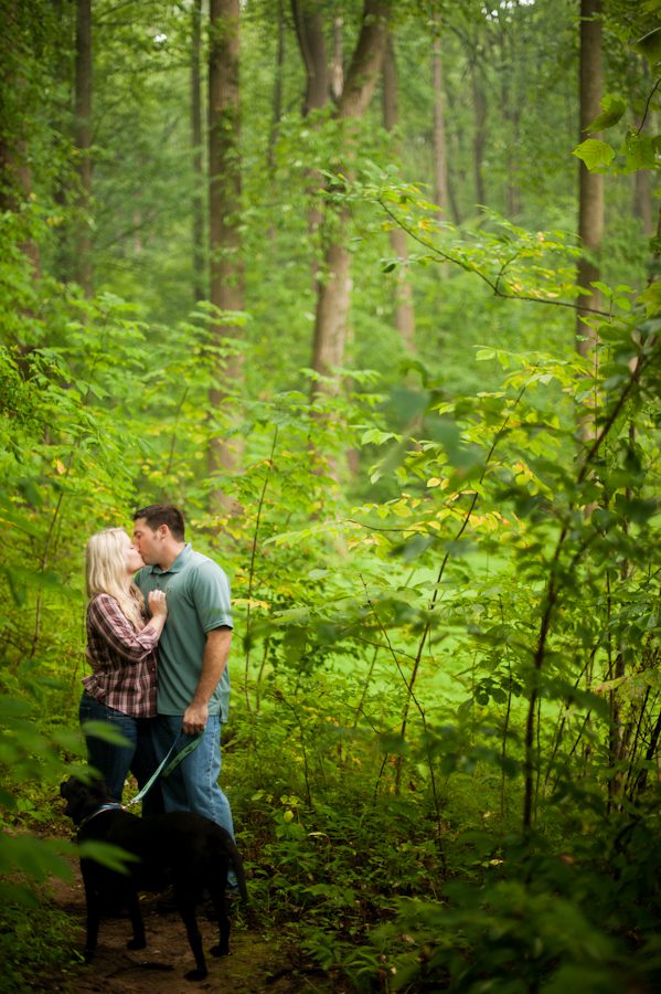 Fran and Joe share a kiss during their engagement session at the Loch Raven Resevoir in Baltimore, MD with Ben Lau Photography.