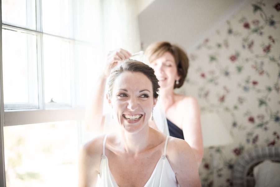 Bride gets ready for her wedding at the Ram's Head Inn on Shelter Island. Captured by New Jersey Wedding Photographer Ben Lau.