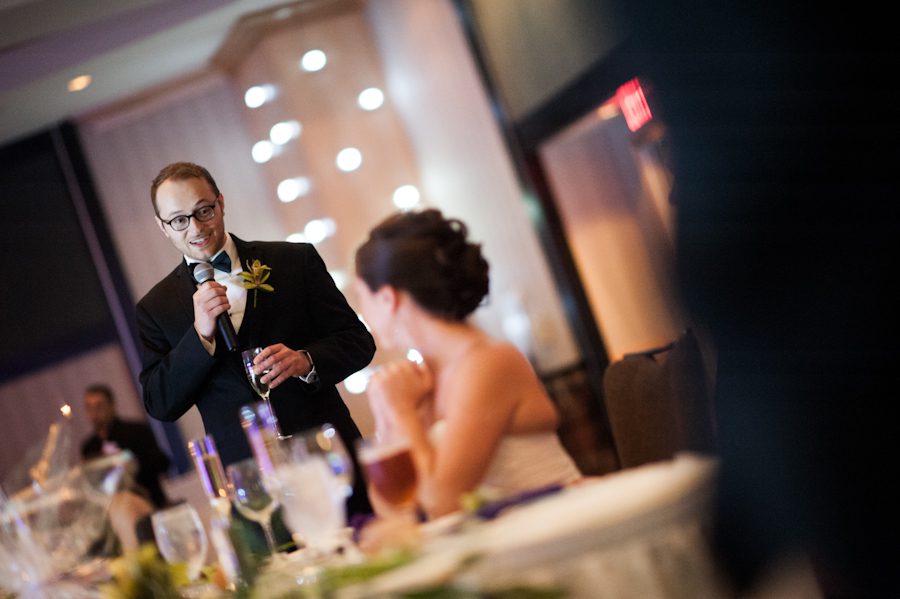 Man of Honor makes a speech at Tessa and Dave's wedding reception at the Heldrich Hotel in New Brunswick, NJ. Captured by awesome northern NJ wedding photographer Ben Lau.