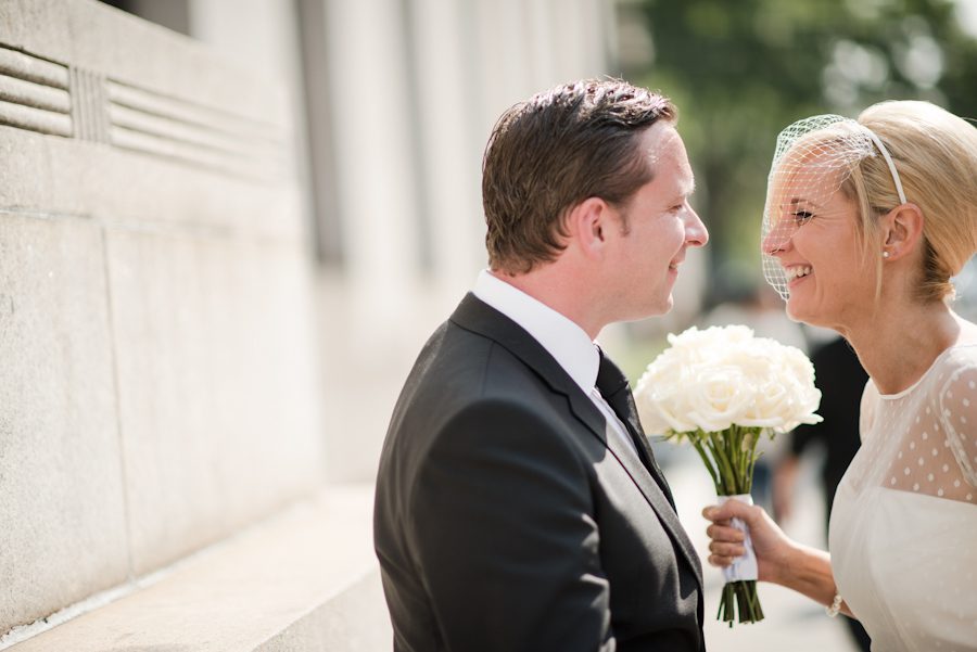 First look between bride and groom before their New York City Hall wedding. Captured by northern NJ wedding photographer Ben Lau.