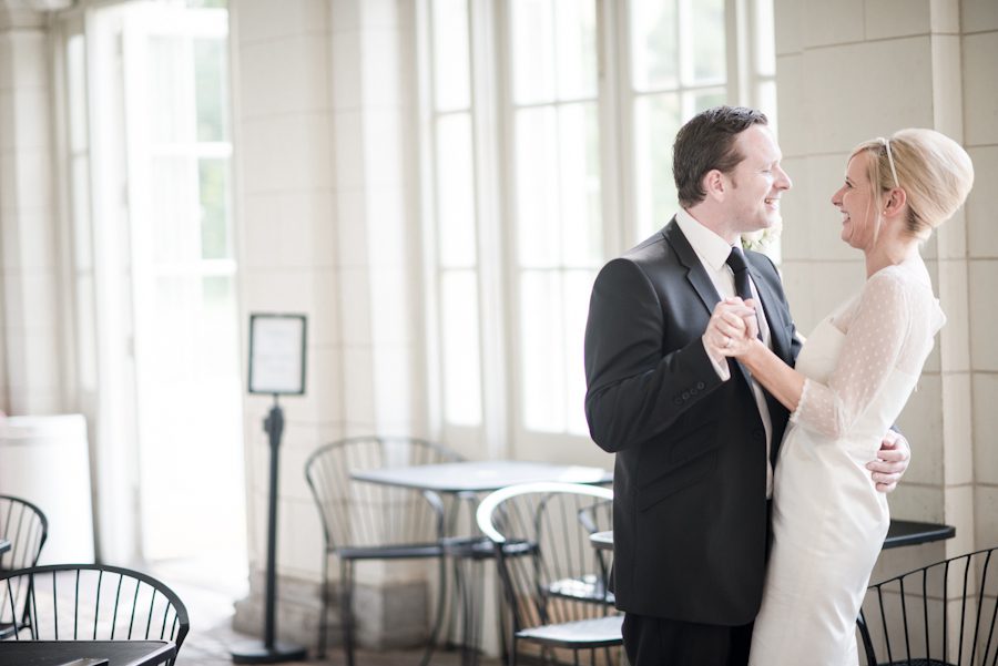 Bride and groom share their first dance in the Audubon Center in Prospect Park after their New York City Hall wedding. Captured by northern NJ wedding photographer Ben Lau.