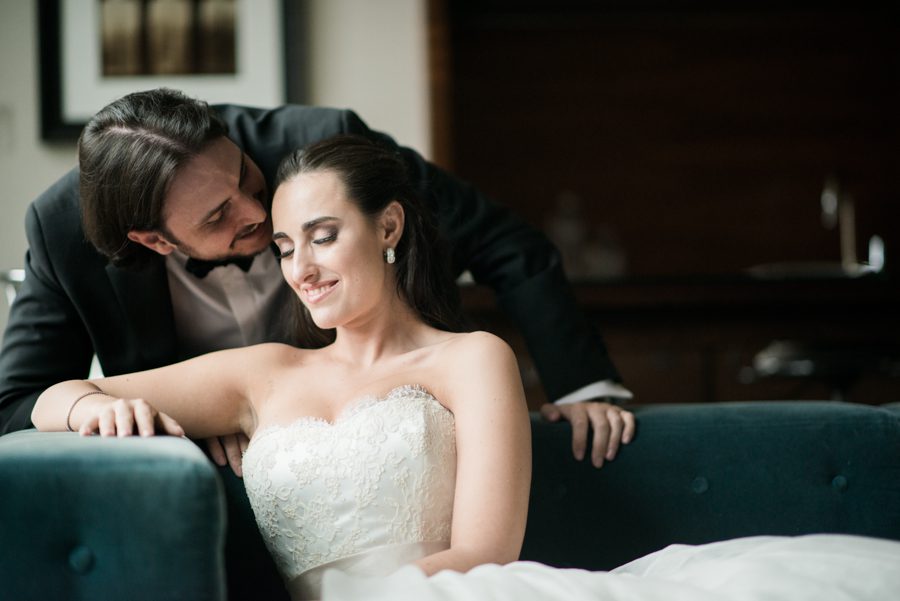 Bride and groom pose for their portraits on the morning of their wedding at the Eventi hotel in New York City. Captured by northern NJ wedding photographer Ben Lau.