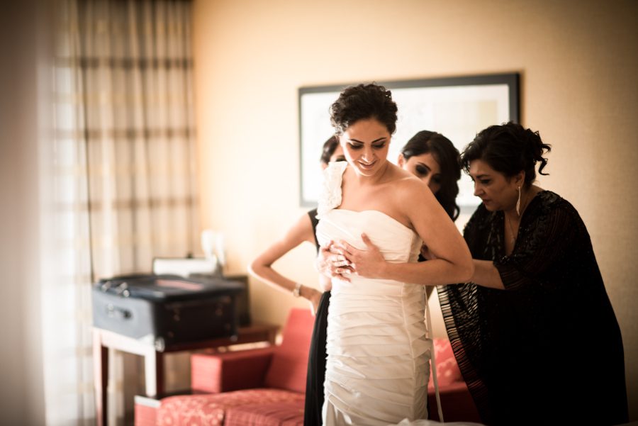 Bride gets ready for her wedding day at the Liberty House in Jersey City, NJ. Captured by northern NJ wedding photographer Ben Lau.