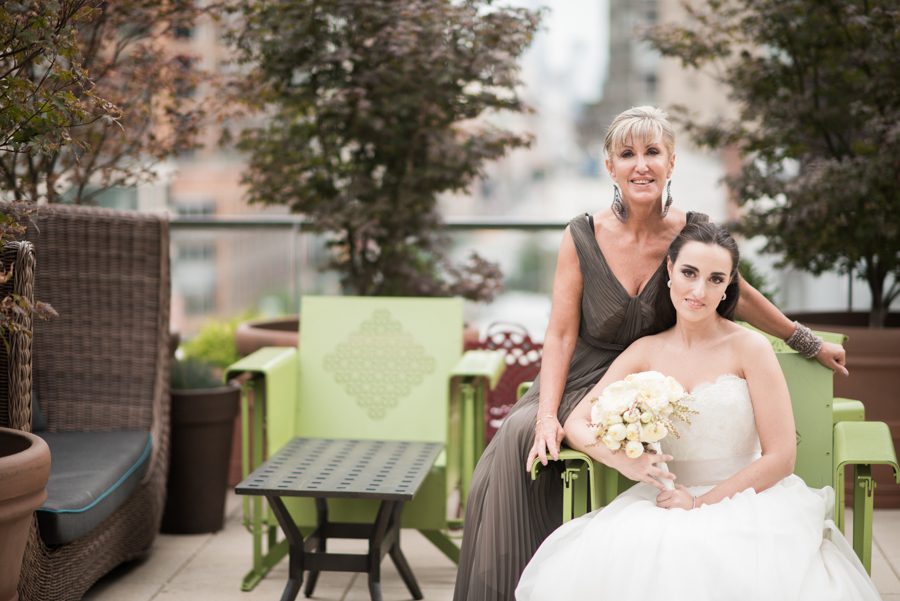 Bride with her mom at a wedding at the Eventi Hotel in New York City. Captured by NYC wedding photographer Ben Lau.