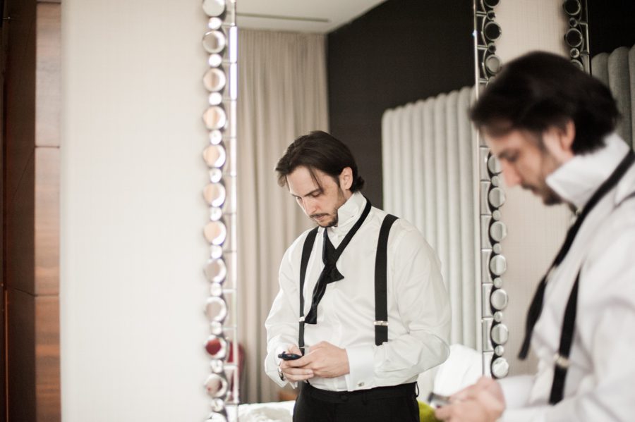 Groom gets ready on the morning of his wedding at the Eventi Hotel in New York City. Captured by NYC wedding photographer Ben Lau.