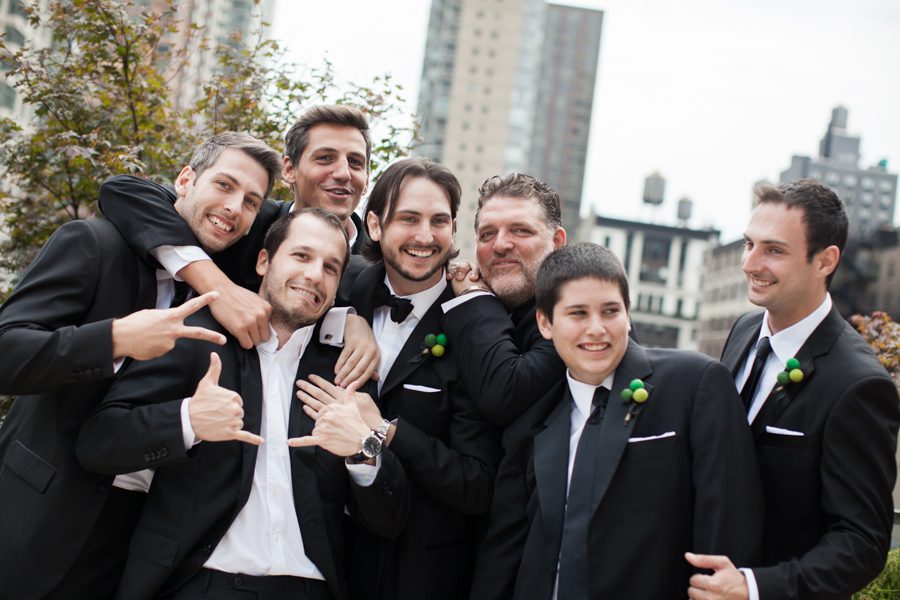 Group portraits at a wedding at the Eventi Hotel in New York City. Captured by NYC wedding photographer Ben Lau