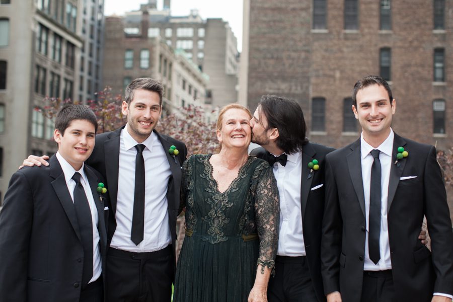 Group portraits at a wedding at the Eventi Hotel in New York City. Captured by NYC wedding photographer Ben Lau