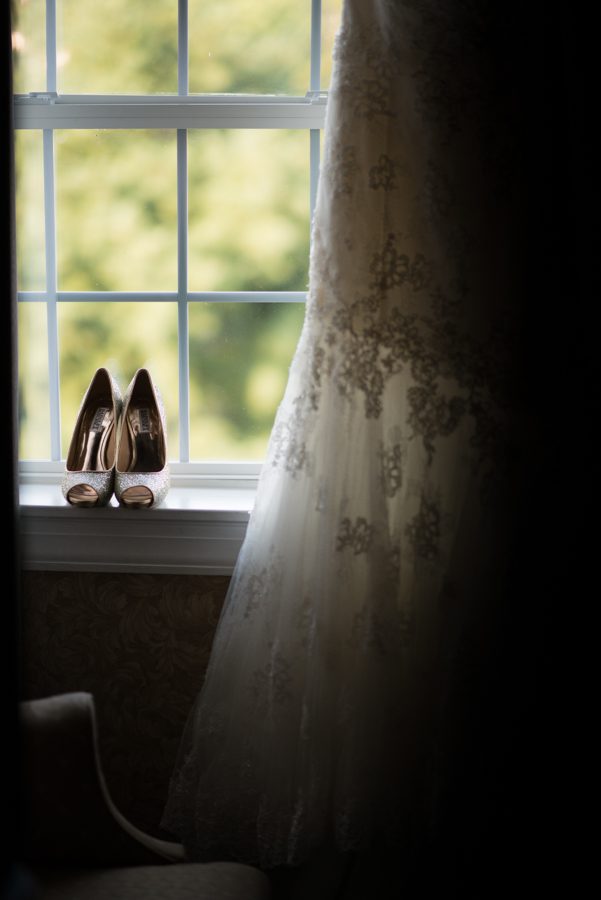 Bride's wedding shoes on the morning of her wedding at The Manor in West Orange, NJ. Captured by northern NJ wedding photographer Ben Lau.