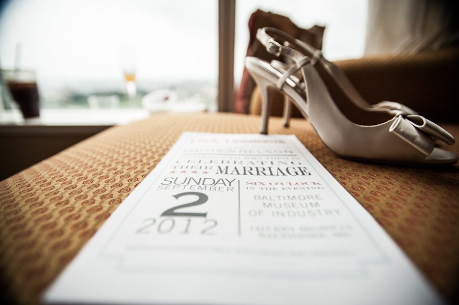 Invitation and shoes for a wedding at the Baltimore Museum of Industry in Baltimore, MD. Captured by northern NJ wedding photographer Ben Lau.