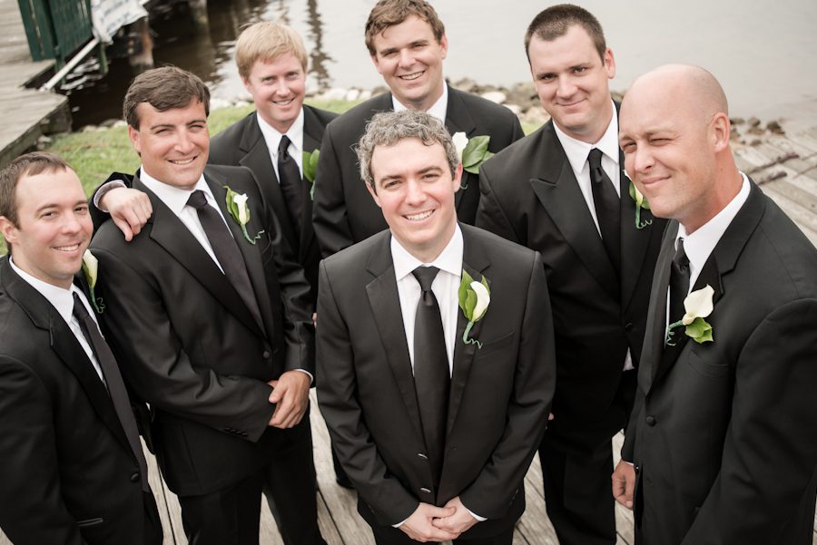 Groom and groomsmen pose for portraits at the Baltimore Museum of Industry in Baltimore, MD. Captured by northern NJ wedding photographer Ben Lau.