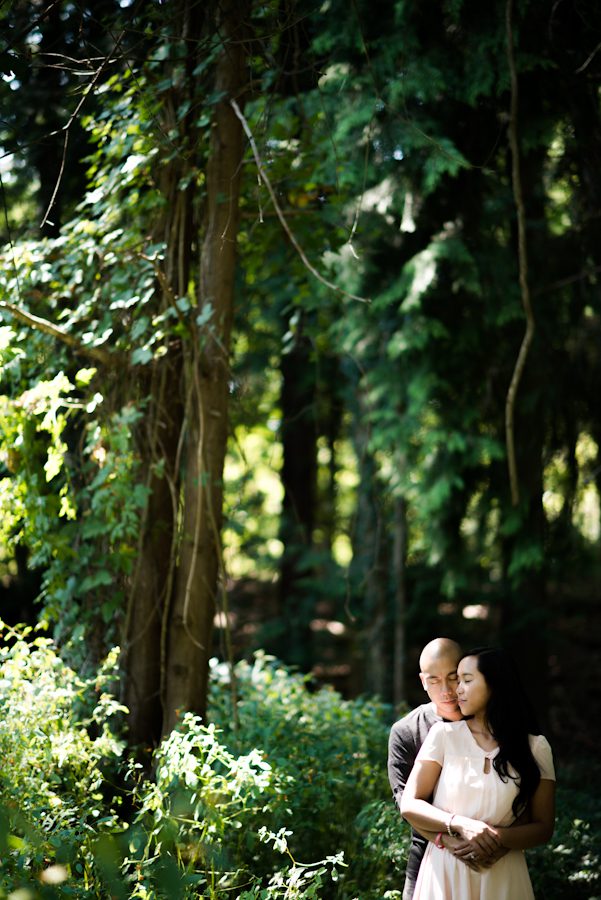 A couple poses at the Nassau County Museum of Art during an engagement session with Ben Lau Photography.