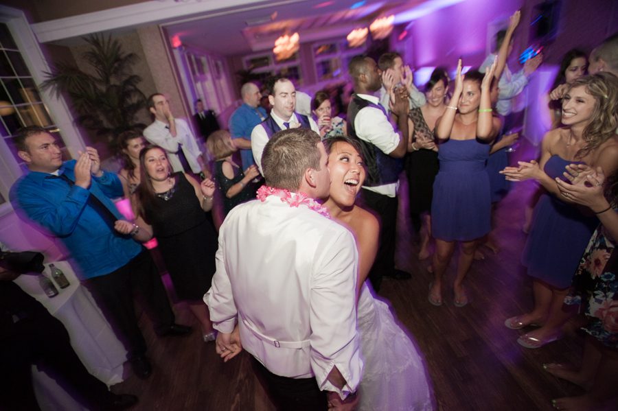 Bride and groom dance together during their wedding reception at the Neshanic Valley Golf Course in Neshanic Station, NJ. Captured by northern NJ wedding photographer Ben Lau.