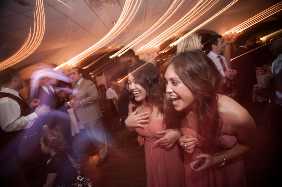 Guests dance during a wedding reception at Perona Farms. Captured by northern NJ wedding photographer Ben Lau.