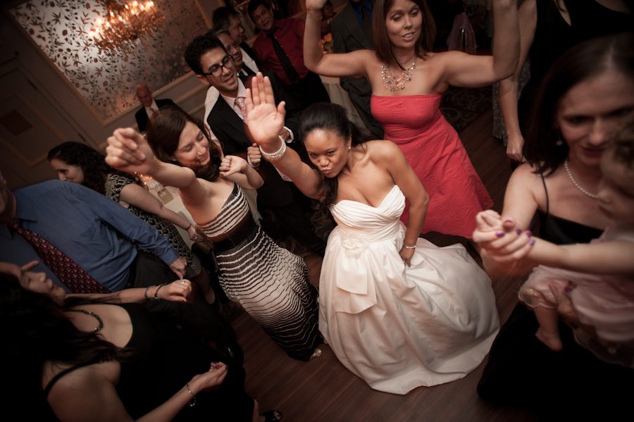 Bride dances during her wedding reception at Perona Farms in Andover, NJ. Captured by northern NJ wedding photographer Ben Lau.