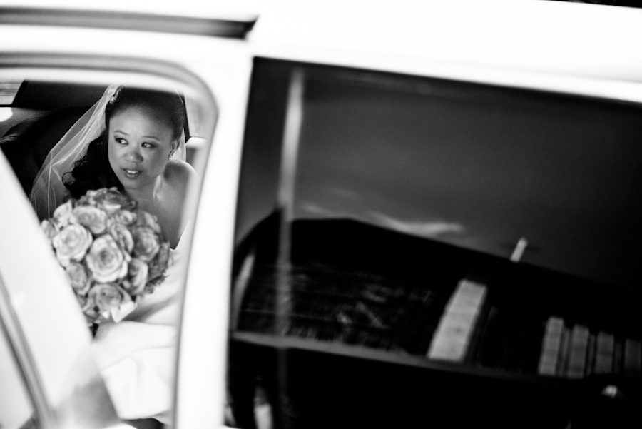 Bride in the limo on the morning of her wedding at Perona Farms in Andover, NJ. Captured by northern NJ wedding photographer Ben Lau.
