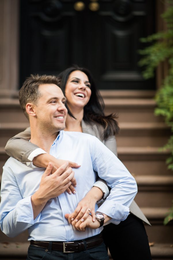 Amedea and Ray share a laugh during their engagement session with NYC wedding photographer Ben Lau.