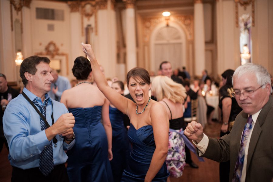 Guests dance during Lauren and Tony's wedding reception at The Belvedere Hotel in Baltimore, MD. Captured by Ben Lau Photography.