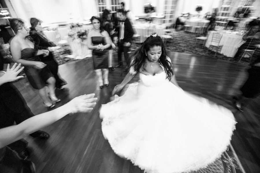 Bride dances at her wedding at the Crystal Plaza in Livingston, NJ. Captured by NJ wedding photographer Ben Lau.