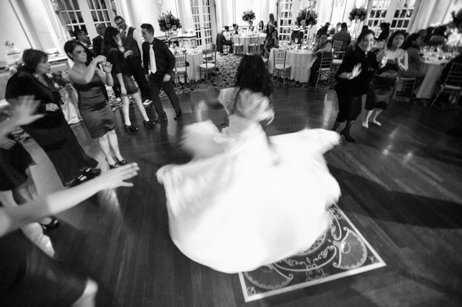 Bride dances at her wedding at the Crystal Plaza in Livingston, NJ. Captured by NJ wedding photographer Ben Lau.