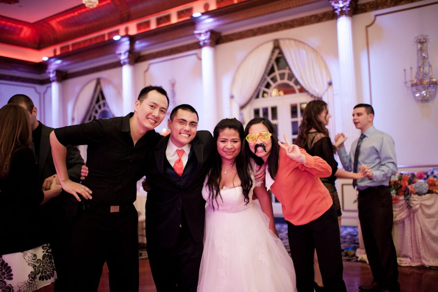 Ben and Karis at a reception at the Crystal Plaza in Livingston, NJ. Captured by NJ wedding photographer Ben Lau.